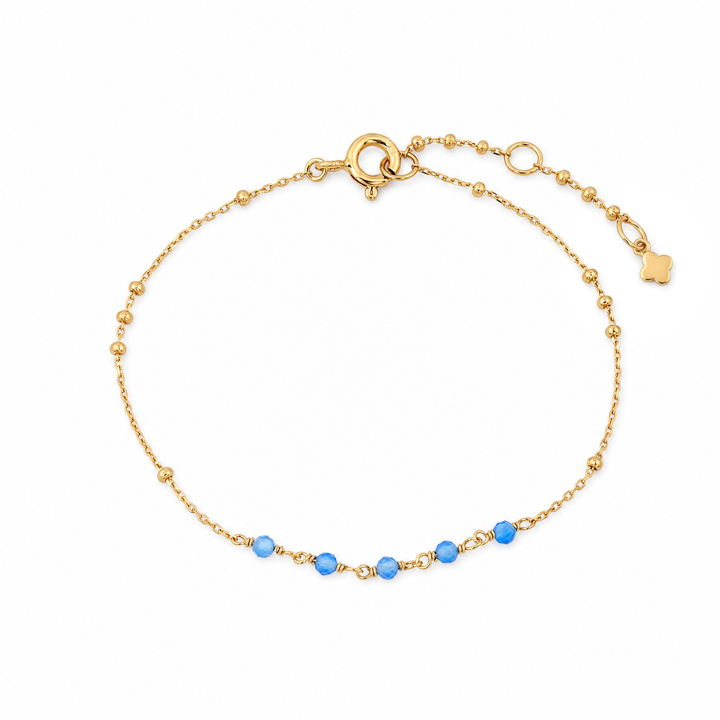 Armband "Siena" mit blauen facettierten Chalcedon-Perlen an vergoldeter Kugelkette