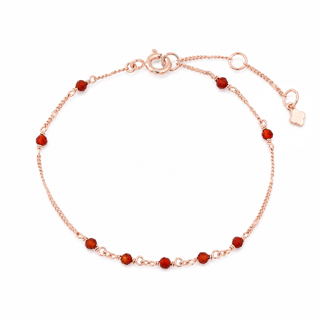 Armband "Valencia" mit roten facettierten Onyx-Perlen an rosévergoldeter Kette