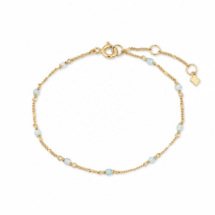Armband "Alba" mit facettierten Aquamarin-Steinchen und goldenen Stäbchen, vergoldet
